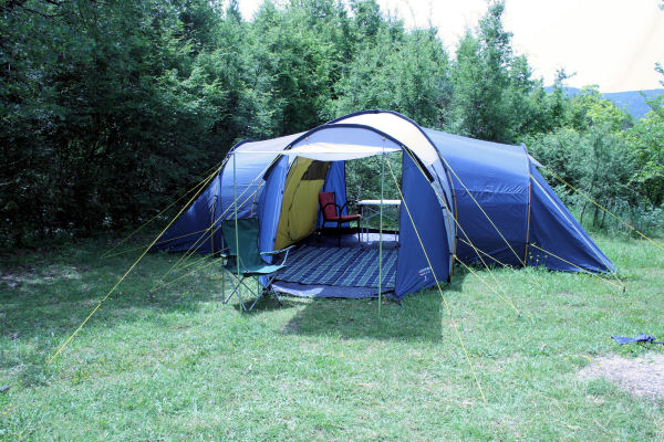 Mimosa Mansion - €25 per person per nightTwo roomed 4-6 person tent with central head height seating space. Two canopy porch openings. curtained windows, storage pockets. Sprung or luxury inflatable mattresses, bedding and towels included.